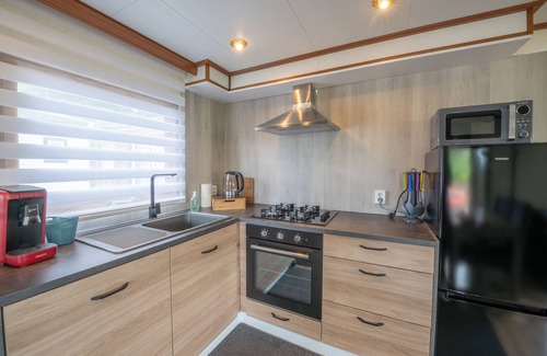 Philippine Ski Chalet | 5-6 Person chalet on quiet family campsite with water sports facilities