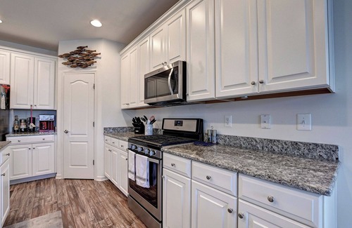 Millville House | 5 Bedroom Dog Friendly Townhome end-unit in the Bishop's Landing community! Community Pool, Shuttle service to the beach, tennis courts, pickleball courts, fitness center and more!