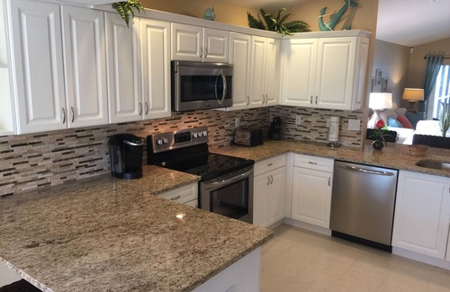 Naples Park Villa | 5⭐️ LUXURY BEACH VILLA with SECLUDED HEATED POOL+HOT TUB SURROUNDED by PALMS