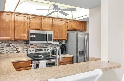 Marco Island Condo | 500 steps from toes in the sand!