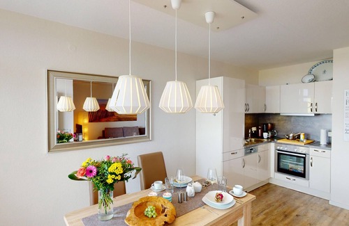 Pelzerhaken Apartment | 52 m² vacation apartment for up to 4 people with sea view, balcony, pool and sauna