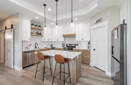Idaho Falls House | 6 bed 3 bath home ~ sleeps 20! w/game room, fireplace, hot tub & playground.