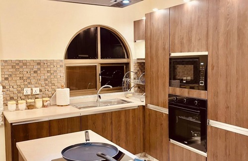 Bahria Town Apartment | 8 Marla 2 Bed Designer Gold Set Garden Front Netflix Prime Transworld