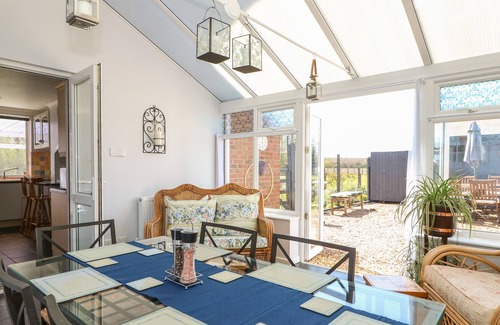 Spalding Cottage | 9 TYDD LOW ROAD, family friendly, with open fire in Tydd St Mary