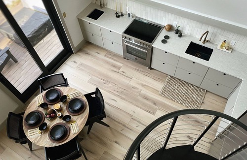 Town of Lumberland Cabin | A modern A-frame, nestled in the woods with relaxing outdoor spaces and firepit.