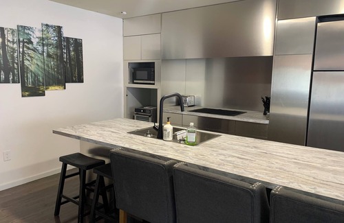 South Lethbridge House | A Peaceful Retreat close to a lake, walking paths, golf, shopping and hospital.