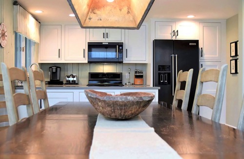 Suttons Bay House | A quick walk to the bay from this charming Suttons Bay hide-away