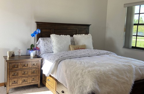 Homestead Bed & Breakfast | A quiet bedroom where nearby birds sing