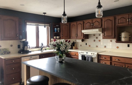 Alton Bay House | A quiet cove, the sunset and a sandy beach, on Lake Winnipesaukee