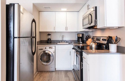 Downtown Louisville Apartment | Abode Downtown Louisville - 4th St Live