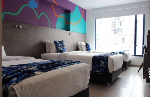 Barrios Unidos Hotel | Agora Suites Self-Service Boutique Hotel