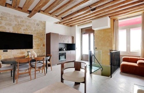 Marais Apartment | Air-Conditioned Duplex Place des Vosges: Comfort Meets Classic Paris