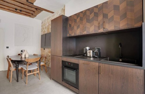 Marais Apartment | Air-Conditioned Duplex Place des Vosges: Comfort Meets Classic Paris