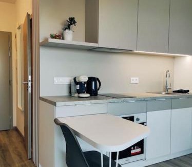 Ruzinov Apartment | Airport studio for two, free parking, airport view