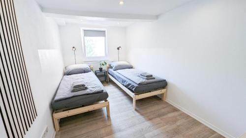 Ludwigsburg Apartment | ALFA Ludwigsburg City Apartment 3 Zimmer für 5 Personen l Parkplatz l Bad I Küche l WIFI & SmartTV l Parking l Bathroom l Kitchen