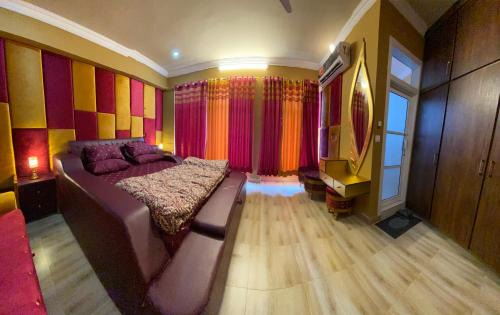 Bhurban Apartment | ALI Luxury & Executive Apartments & Cottages Near PC Bhurban - Cooling & Heating Inverter-Gas Blow Heater-Full Kitchen-Mountain View-Lawn-Play Area-55 inches LED-WIFI-Lift- Free Breakfast