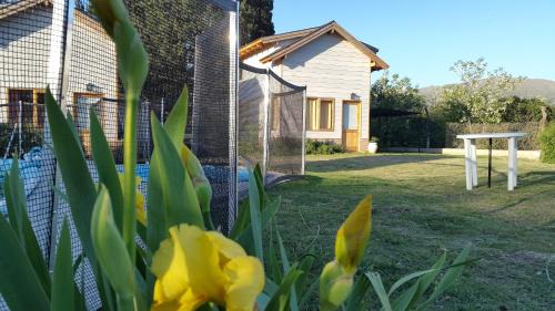Huerta Grande Cabin | Altos del Pucara Piscina Climatizada vista a las sierras juegos infantiles