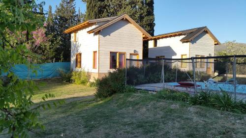 Huerta Grande Cabin | Altos del Pucara Piscina Climatizada vista a las sierras juegos infantiles