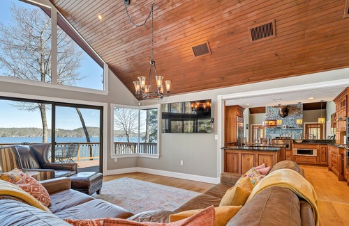 West Alton House | Amazing lakefront home with private beach, kayaks, fireplaces, community dock