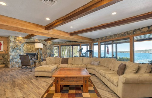 West Alton House | Amazing lakefront home with private beach, kayaks, fireplaces, community dock