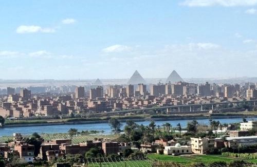 Cairo Apartment | Amazing Nile View and Pyramids Apartment