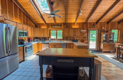 Swanton House | Amazing Outdoor Amenities: Tons of Seating, Dock, Hot Tub, Fire Pit + More