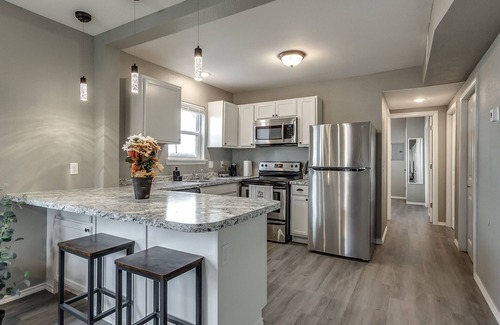 Bartlesville Apartment | Amazingly renovated downtown 1BD 1 BR apt with Washer and dryer!