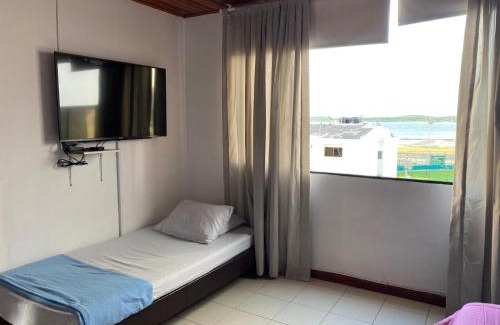 Cartagena House | Amplia habitación con vista al mar y baño privado