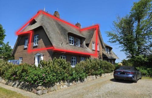 Suddorf House | Amrum Lounge - Stilvolle Ferienwohnung mit Gartenidylle