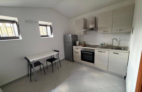 Caltagirone Apartment | An elegant retreat overlooking the city of mosaics