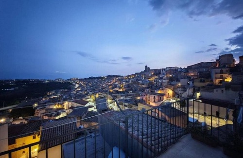 Caltagirone Apartment | An elegant retreat overlooking the city of mosaics