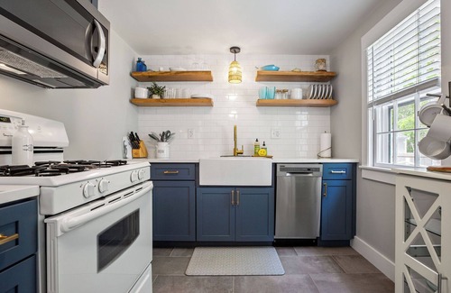 South Dennis House | An elevated Cape Cod escape close to coveted beaches with fully fenced yard, new deck and firepit