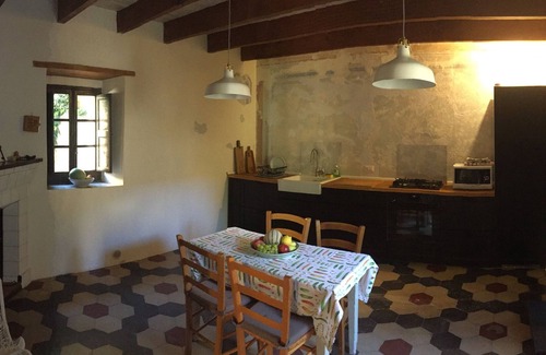 Guspini House | Ancient house with garden - sea, relaxation and vacation/Casa Terra - IUN P7085