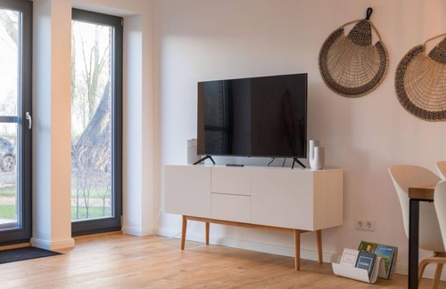 Rysum Apartment | "Anni" a beautiful cozy maisonette apartment with terrace in the