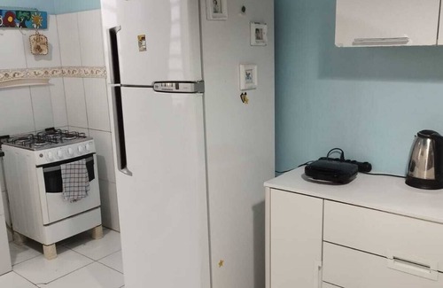 Praia de Belas Apartment | Apartment. You and your family will be close to everything! Pets accepted.