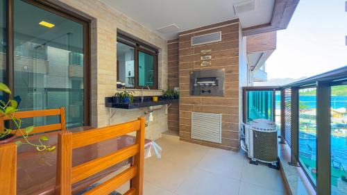 Praia Grande House | Apartamento Vista Mar e Piscina- Em Frente à Praia e Próximo a Restaurantes