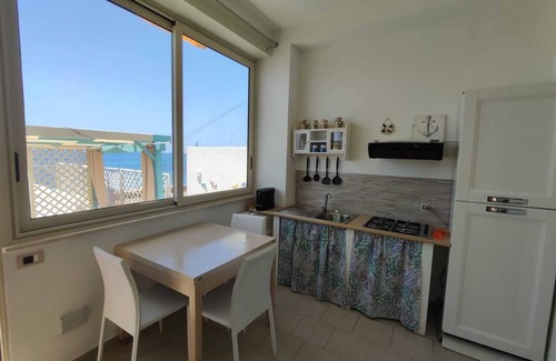 Seccagrande Apartment | "Apartment 4- 5 places" with terrace by the sea, barbecue, chairs, deck chairs.