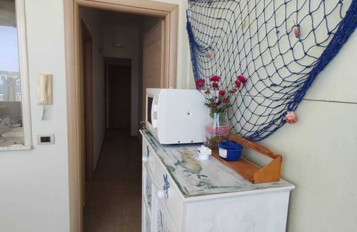 Seccagrande Apartment | "Apartment 4- 5 places" with terrace by the sea, barbecue, chairs, deck chairs.