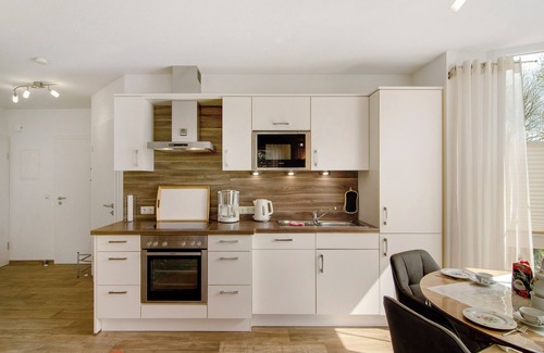 Greetsiel Apartment | Apartment 'Ferienwohnung Maren-marie' with Private Terrace, Private Garden and Wi-Fi