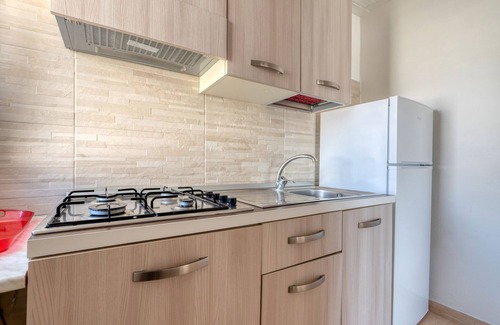 Torre Lapillo Apartment | Apartment 'Florence - Bilocale 1' with Private Terrace, Wi-Fi and Air Conditioning