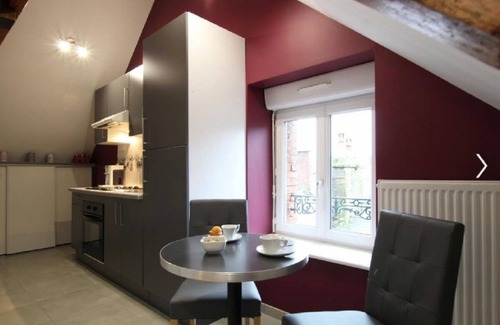 Villedieu-les-Poeles Apartment | Apartment with terrace in a 14th century building