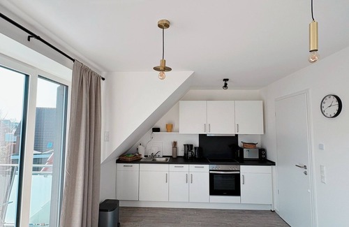 Neuharlingersiel Apartment | Apartment KÖÖK III Heimathafen - modern, balcony, close to the beach