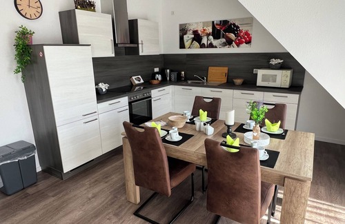 Papenburg Apartment | Apartment "Neptun" Papenburg 2SZ EBK Modern bathroom Large roof terrace New building WLAN