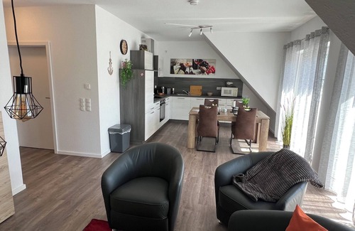 Papenburg Apartment | Apartment "Neptun" Papenburg 2SZ EBK Modern bathroom Large roof terrace New building WLAN