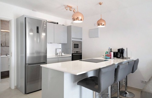 Playa Blanca Apartment | Apartment "Puerto Chico E" with Sea View, Shared Pool, Terrace & Wi-Fi