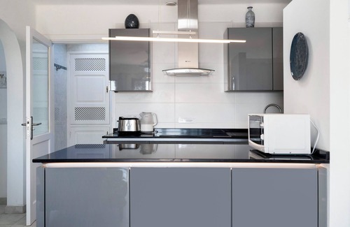 Playa Blanca Apartment | Apartment "Puerto Chico Q" with Sea View, Shared Pool, Terrace, A/C & Wi-Fi