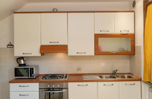 Suvereto Apartment | Apartment "Pugnitello" with Terrace, Shared Pool & Wi-Fi