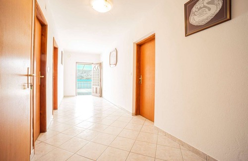 Zubovici Apartment | Apartment right on the sea, boat dock and shared terrace on the beach