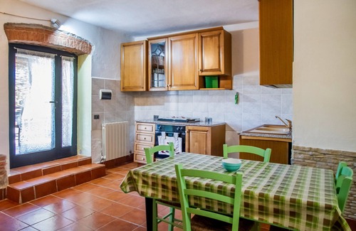 Gavorrano Apartment | Apartment 'Taverna' with Private Terrace, Shared Garden and Wi-Fi