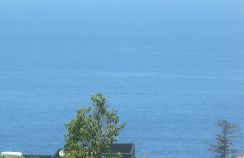 Puerto de la Cruz Apartment | Apartment with great sea and Teide view, with 2 terraces, pool and beautiful gardens